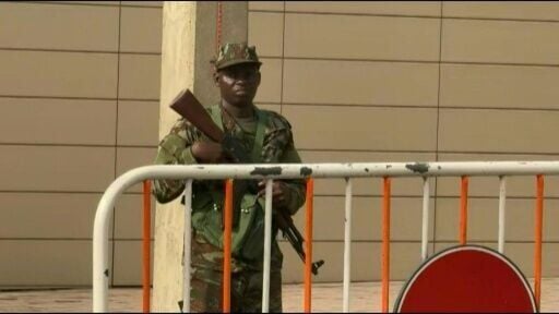 Outside the Benin presidential palace following foiled coup attempt