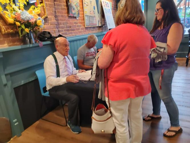 James Spann signs books