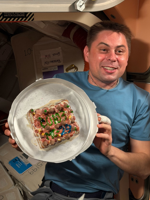 NASA astronauts make space ‘cake’ to celebrate new crew members