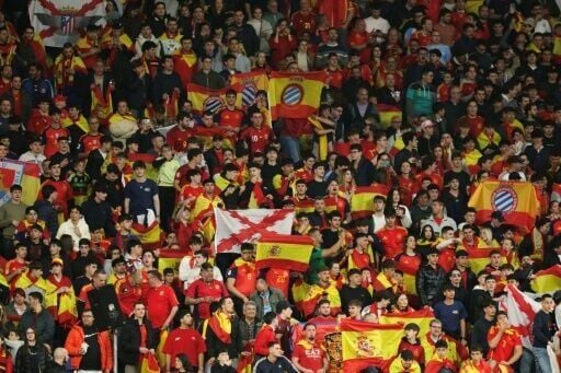 Spain supporters hold up flags during the friendly between Spain and Egypt at RCDE Stadium in Cornella de Llobregat, near Barcelona, on March 31, 2026