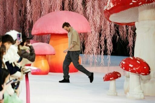 Matthieu Blazy emerges to acknowledge the audience