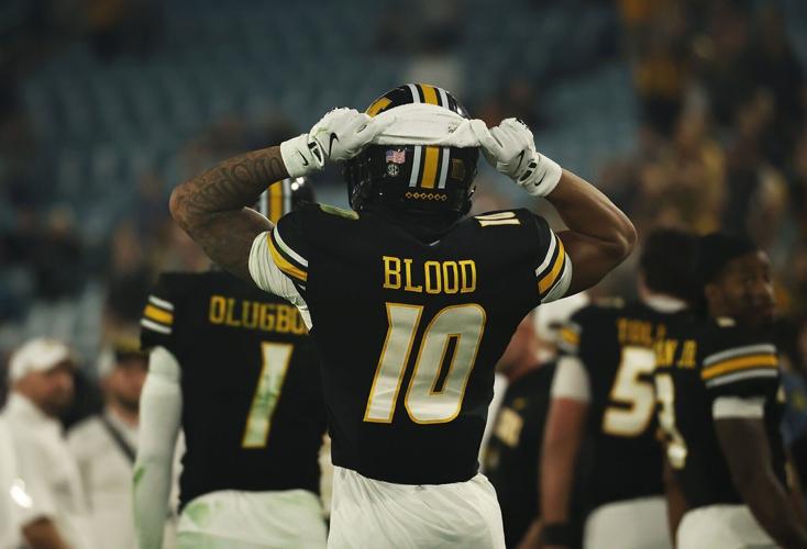 Mizzou wide receiver Daniel Blood (10) walks towards the sideline