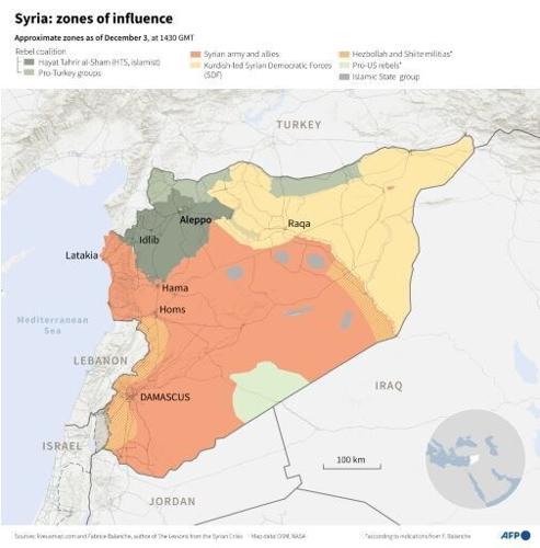 Syrian rebels surround Hama 'from three sides', monitor says