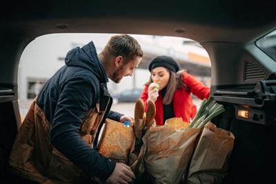 Young couple in groceries shopping