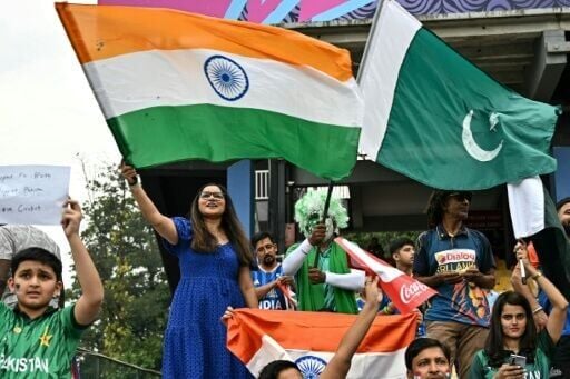 Rival fans wave the flags of India and Pakistan from the stands at the 2026 T20 World Cup group stage match in Colombo