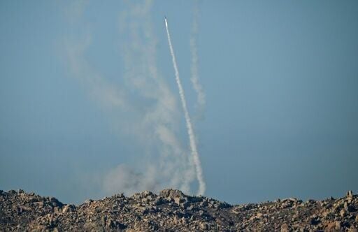 Chinese People's Liberation Army (PLA) soldiers fire a rocket into the air as they conduct military drills on Pingtan island, the closest point to Taiwan, on December 30, 2025