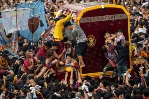 Crowds throng as Jesus statue parades through Philippine capital