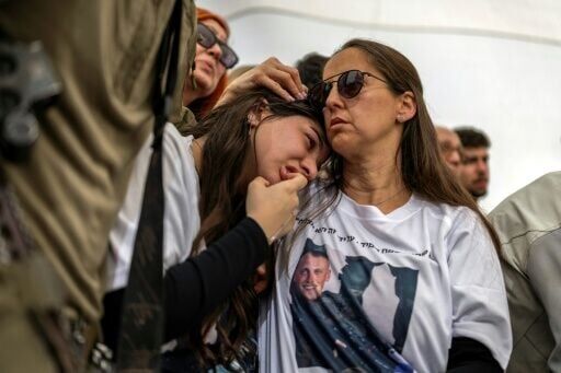 Family and friends mourn at the funeral of Israeli Staff Sergeant Maxsim Entis, who was killed in combat in southern Lebanon, in Bat Yam, south of Tel Aviv, on March 31, 2026