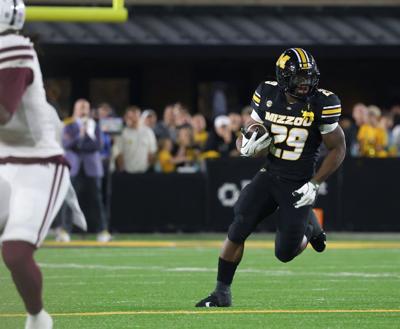 Mizzou running back Ahmad Hardy (29) rushes downfield (copy)