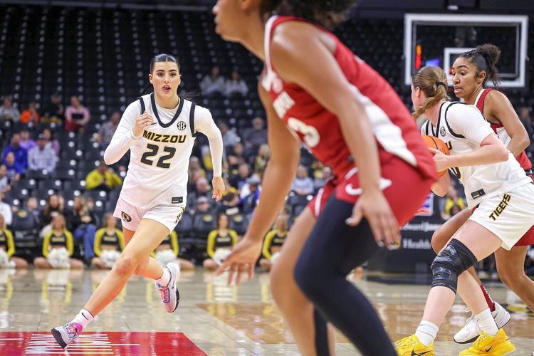 Mizzou guard Chloe Sotell (22) runs down the court