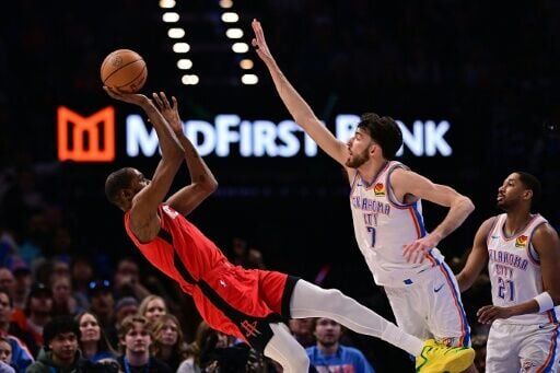 Houston's Kevin Durant attempts a shot over Chet Holmgren in the Rockets' NBA victory over the Oklahoma City Thunder