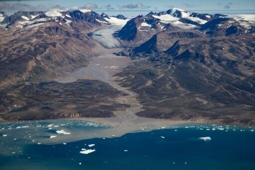 Macron, on Greenland visit, berates Trump for threats against the territory