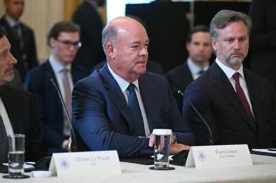 ConocoPhillips CEO Ryan Lance (C) pictured during a meeting at the White House in January 2026