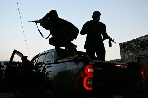 Imposing pickup trucks symbolise Pakistan's power gulf