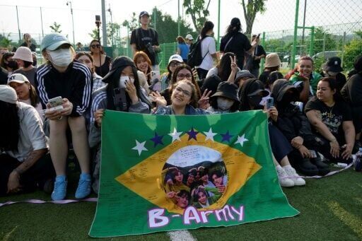 Two BTS megastars released from South Korea military