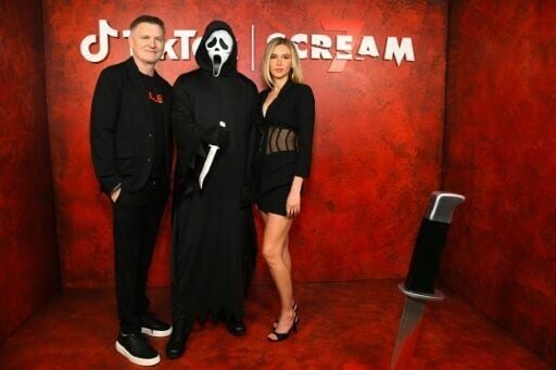 Kevin Williamson at a Scream 7 promotional event in Los Angeles with actress Isabel May