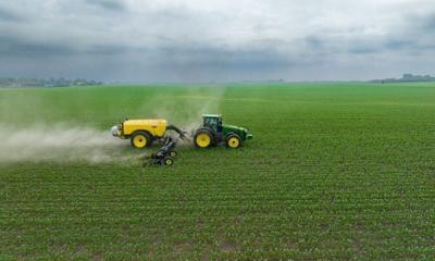 tractor-spraying-fertilizer-on-cornfield.jpg