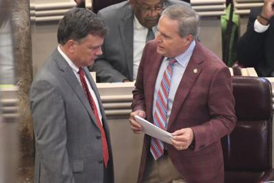 Rep. Danny Garrett, R-Trussville (right), the chair of the House Ways and Means Education Committee, speaks with Sen. Arthur Orr, R-Decatur, the chair of the Senate Finance and Taxation Education Committee, on the floor of the Alabama House of Represent...