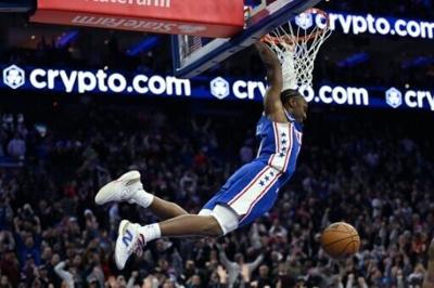 Philadelphia's Tyrese Maxey throws down a dunk in the 76ers' NBA overtime victory over the Houston Rockets