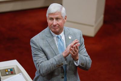Rep. Alan Baker, R-Brewton, applauds during a session of the Alabama House of Representatives on Tuesday, March 14, 2023. (Stew Milne for Alabama Reflector)