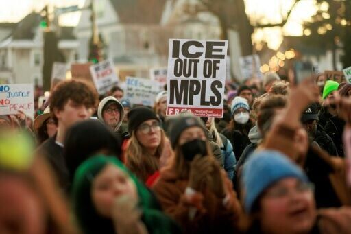 Thousands of protesters took to the frigid streets of Minneapolis after the shooting, holding signs reading 'ICE out of MPLS,' a common abbreviation for the city