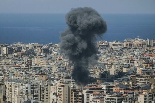 Smoke rises from the site of an Israeli airstrike that targeted an area in Beirut’s southern suburbs on March 11, 2026
