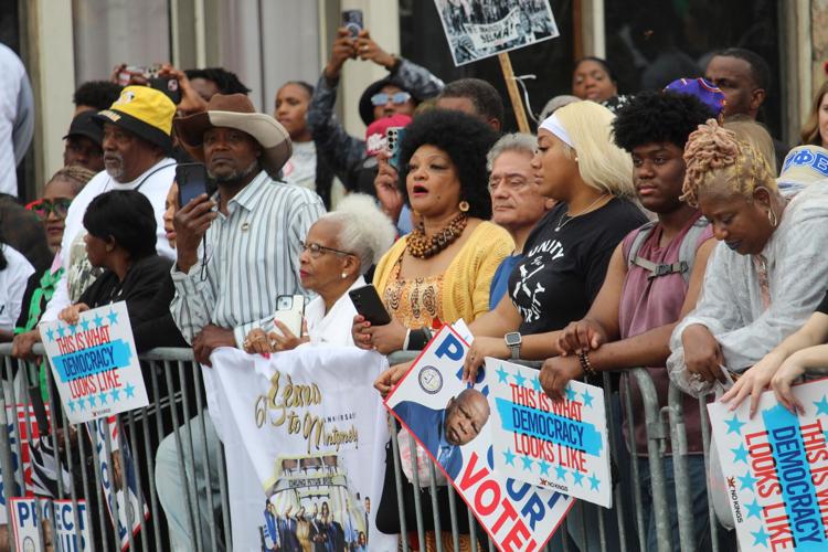 Marcher singing at Jubilee