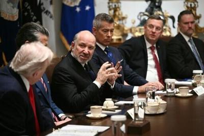 US Secretary of Commerce Howard Lutnick (3L) speaks as President Donald Trump (L) hosts a cabinet meeting at the White House on January 29