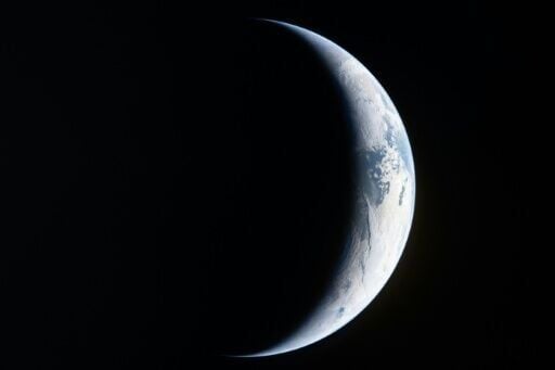 An Artemis II crewmember took a picture showing a sliver of Earth from the window of the Orion spacecraft