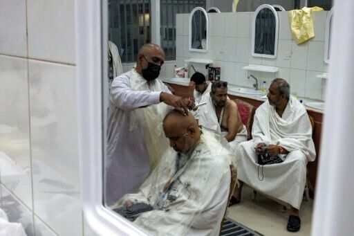 Inside Saudi's hajj-only barbershop, shaving thousands of heads in a day