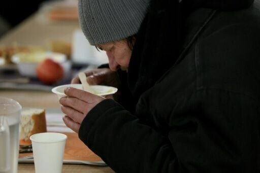 At a charity-run shelter in Paris, volunteers have been handing out hot meals