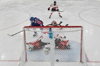 Golden moment: Megan Keller scores the winning goal to give Team USA the Olympic women's ice hockey gold medal