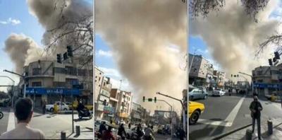 This combination of video grabs taken from UGC images posted on social media and verified by AFPTV teams show a repoted explosion in Tehran amid strikes by the United States and Israel