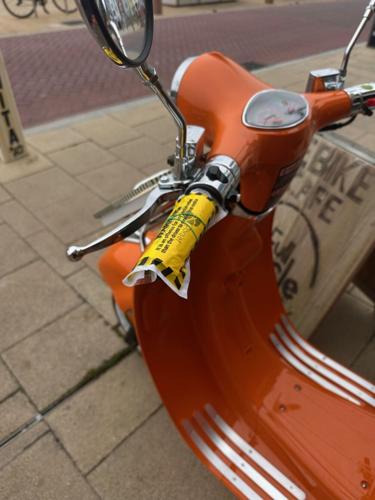 Parking ticket issued to restaurantÂ’s decorative bike mascot