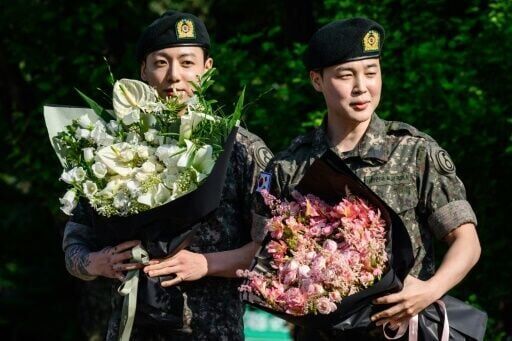 Two more BTS megastars released from South Korea military service