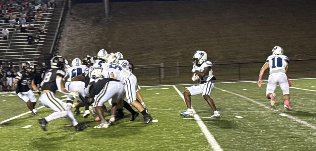 Demopolis running football