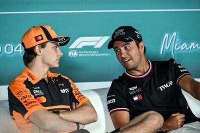 McLaren's Australian driver Oscar Piastri (L) and Cadillac's Mexican driver Sergio Perez attend a press conference ahead of the 2026 Miami Formula One Grand Prix