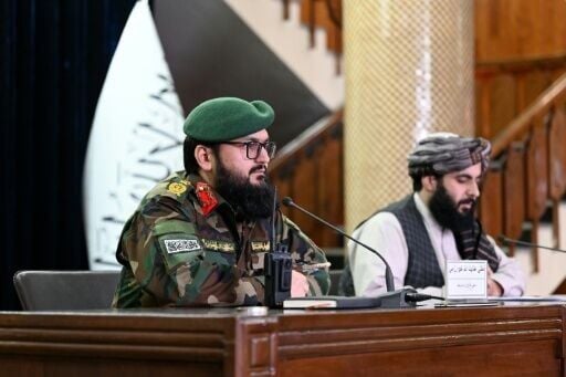 Afghan government deputy spokesman Hamdullah Fitrat (R) said more than 8,000 Afghans had been forced from their homes due to the fighting with Pakistan