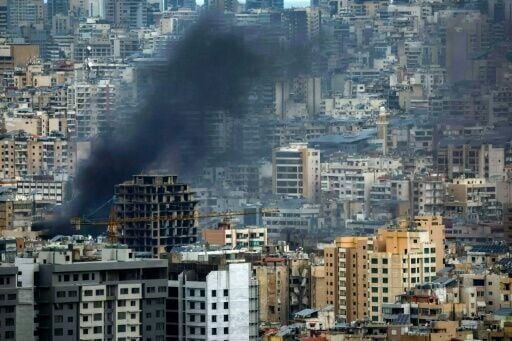 Israeli airstrikes have left smoke rising over Beirut's southern suburbs, now largely deserted since Israel began frequent attacks against Hezbollah earlier in the month