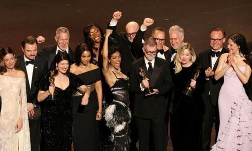 The cast and crew of 'One Battle After Another' celebrate their Oscar win for best picture