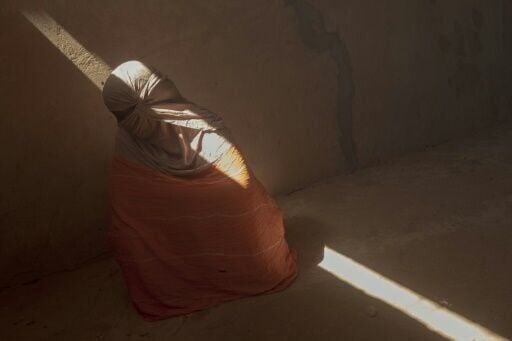 A Malian refugee woman, whose husband was executed in Mali, is seen at the M'berra refugee camp in Mauritania