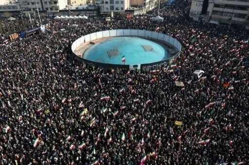 Demonstrators gather for a rally in support of Iran's new supreme leader in central Tehran on Monday