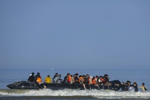 UK, France unveil migrants deal as Macron wraps up state visit