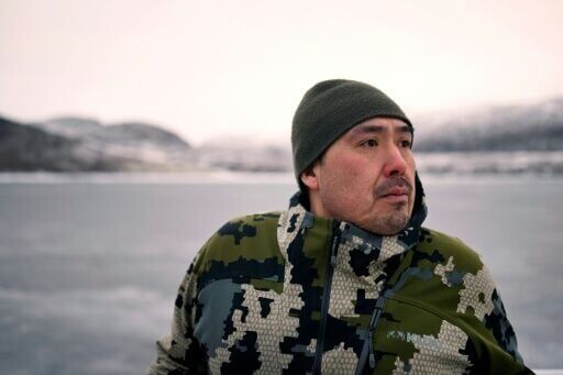 Snow and ice are slow to arrive, undermining traditional livelihoods such as that of hunter and fisherman Malik Kleist