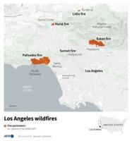 Firefighters race to beat LA blazes as winds grow and death toll hits 16