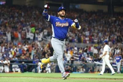Eugenio Suarez celebrates his home run during Venezuela's 4-2 World Baseball Classic semi-final victory over Italy