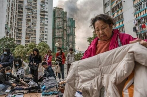 Hong Kong residents have rushed to help survivors of the deadly apartment complex blaze