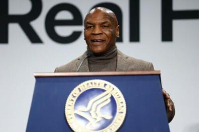 Former boxing champ Mike Tyson speaks at a Trump administration event encouraging Americans to eat health food