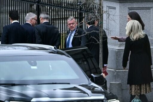 Danish Foreign Minister Lars Løkke Rasmussen leaves the White House complex after the talks