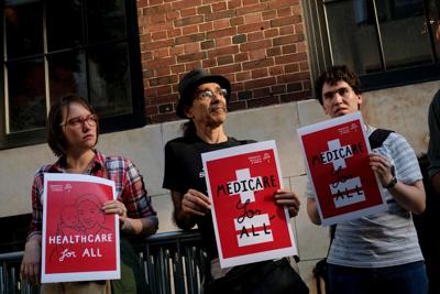 NEW YORK, NY - JULY 5: A small group of activists rally against the GOP health care plan outside of the Metropolitan Republican Club, July 5, 2017 in New York City. Republicans in the Senate will resume work on the bill next week when Congress returns t...